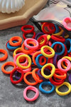 several pairs of scissors sitting on a table 